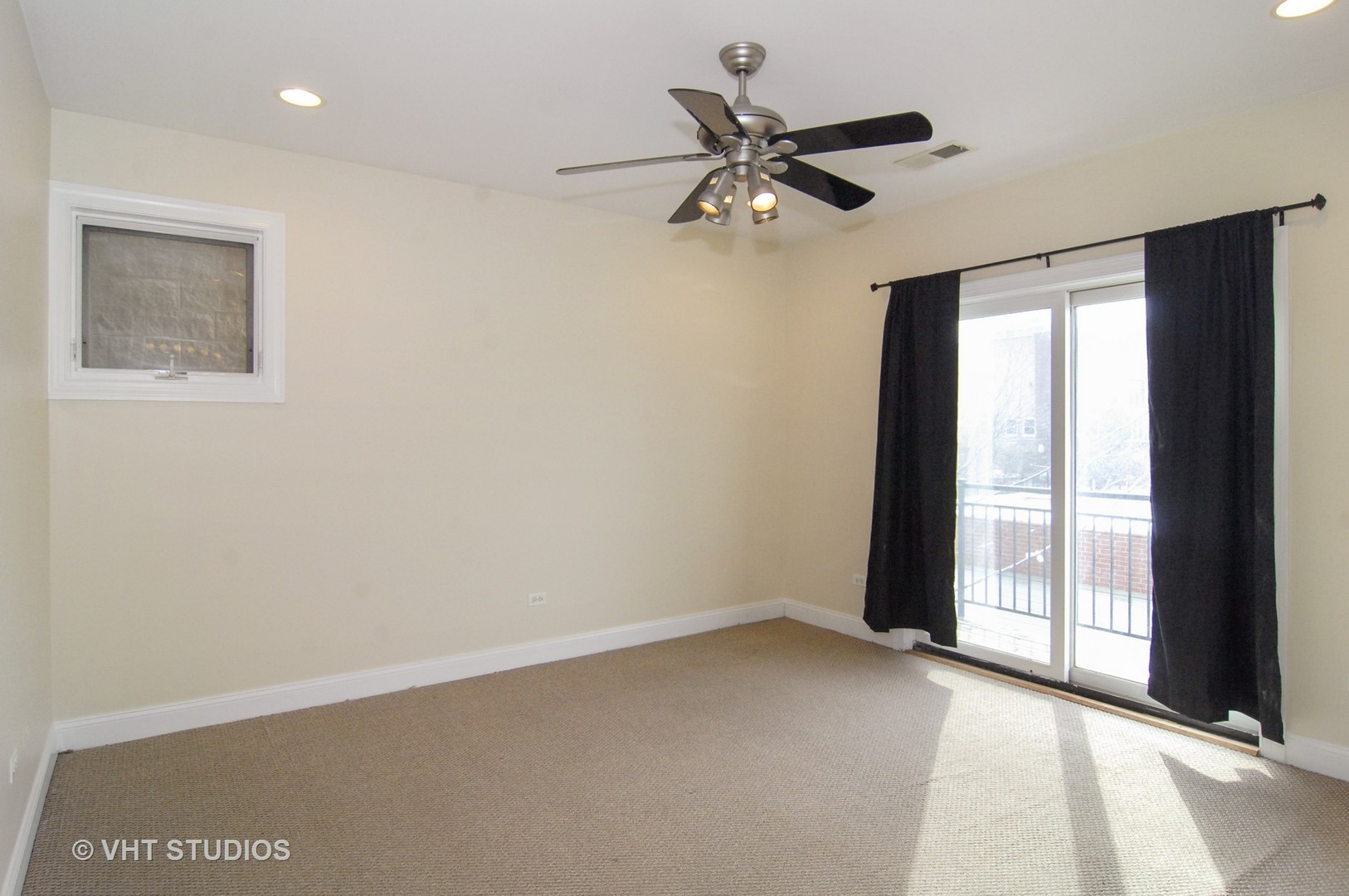 31 East 26th Street, Unit 3 Chicago, IL 60616 - Photo 4 of 10 a view of an empty room with a window