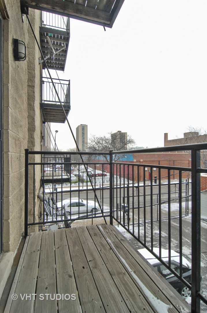 31 East 26th Street, Unit 3 Chicago, IL 60616 - Photo 10 of 10 a view of balcony with wooden floor