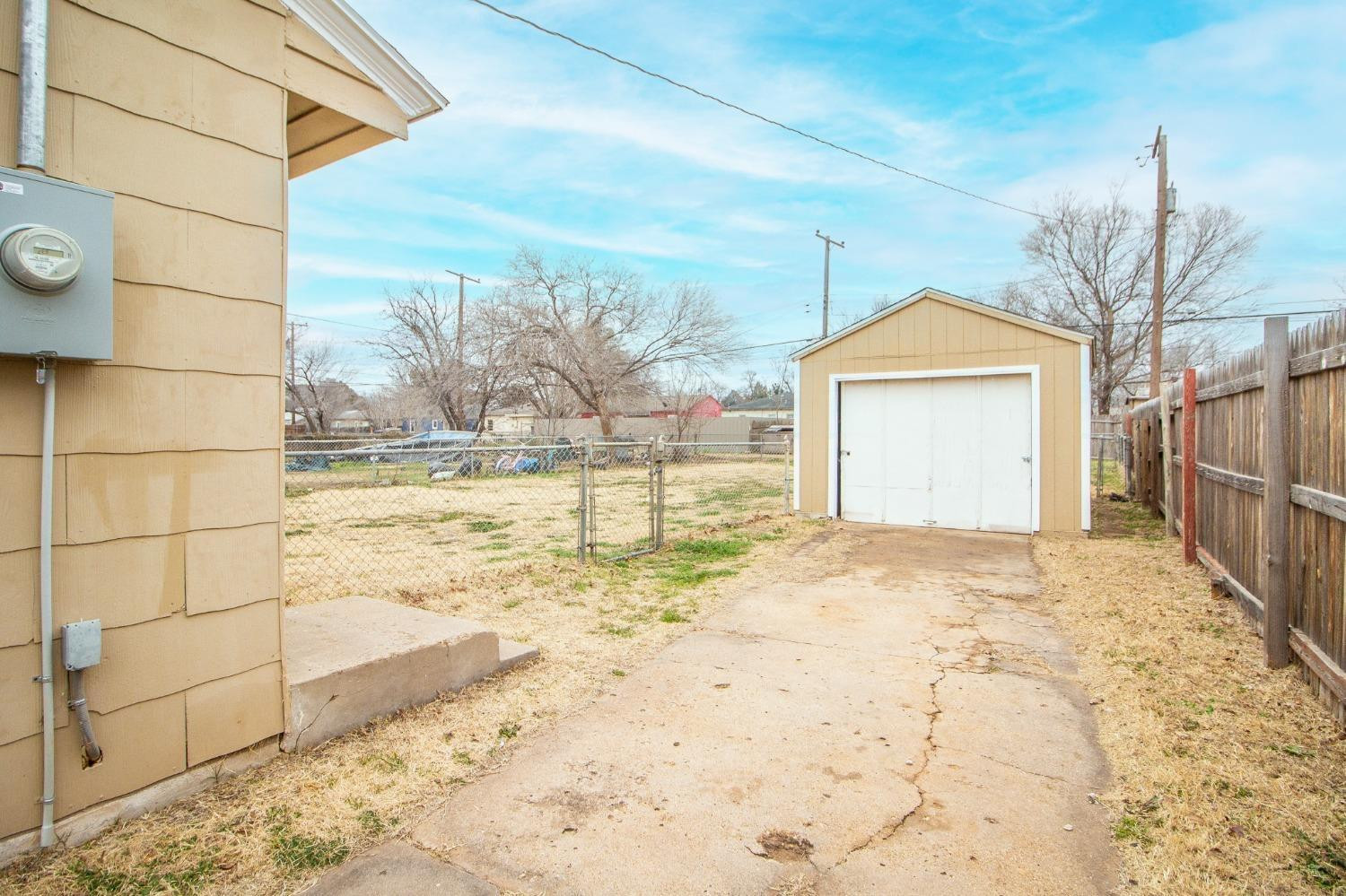 2715 36th Street Lubbock, TX 79413 - Photo 11 of 14 a view of a backyard of the house