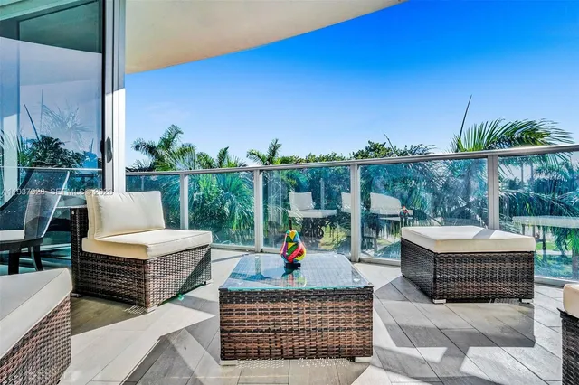 a couch sitting in middle of a city