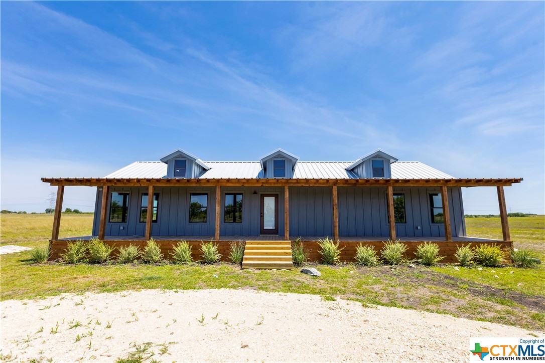 1673 Scull Road San Marcos, TX 78666 - Photo 1 of 1 a view of a house with a yard