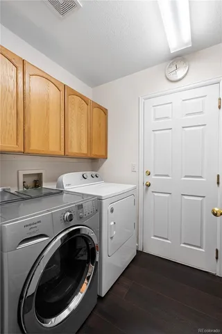 a view of a storage & utility room with washer and dryer