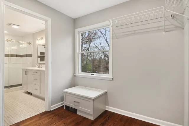 a room with a bed and a window