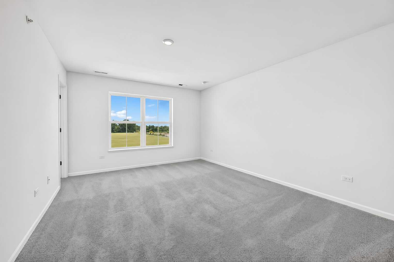 403 Cold Spring Street Algonquin, IL 60102 - Photo 10 of 18 a view of an empty room with a window