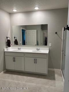 1110 Trinity Street Rockledge, FL 32955 - Photo 14 of 23 a bathroom with a sink vanity and mirror