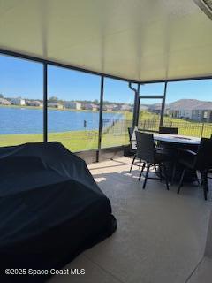 1110 Trinity Street Rockledge, FL 32955 - Photo 20 of 23 a living room with a bed furniture and a large window