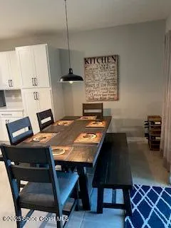 a view of a workspace with furniture