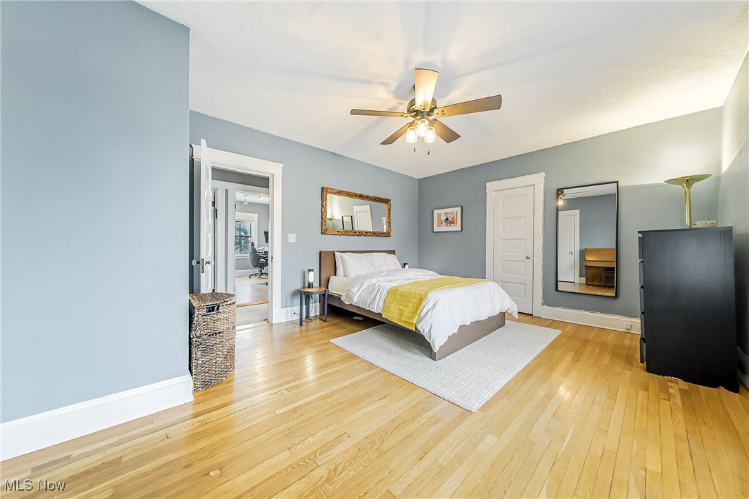 3733 Montevista Road Cleveland, OH 44121 - Photo 16 of 35 Bedroom with light wood-type flooring and ceiling fan