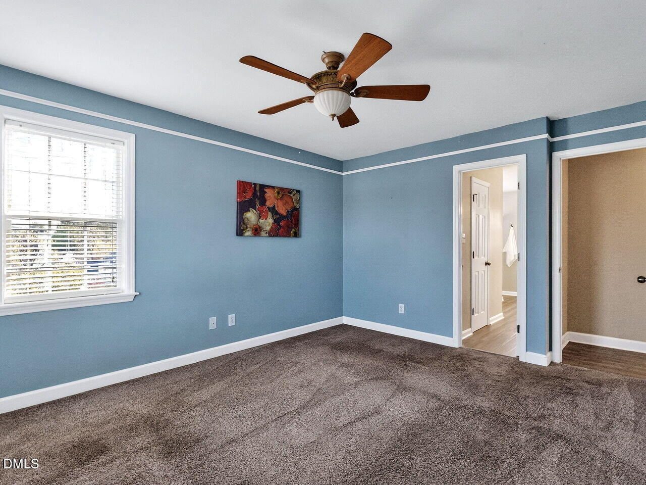 4500 Rivershyre Way Raleigh, NC 27616 - Photo 28 of 42 a view of an empty room with a ceiling fan