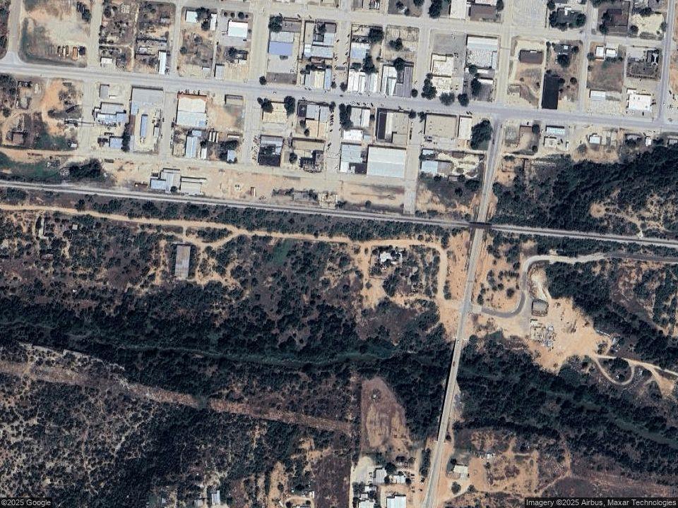 a view of building with large tree