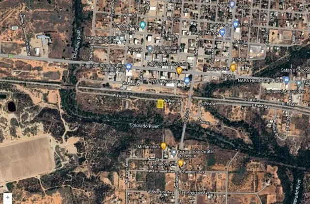 a view of a city from a yard