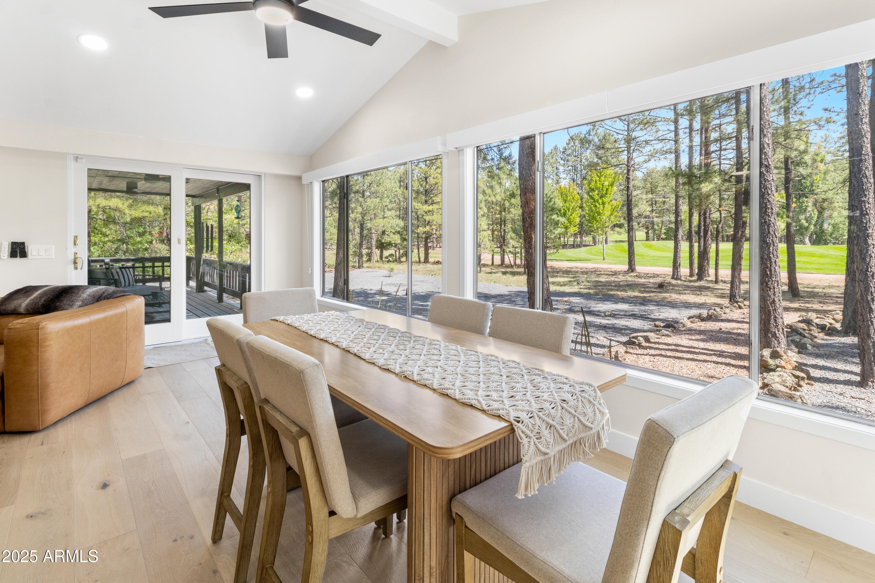 7451 Buck Springs Road Pinetop, AZ 85935 - Photo 15 of 35 a view of a dining room and furniture window and outside view