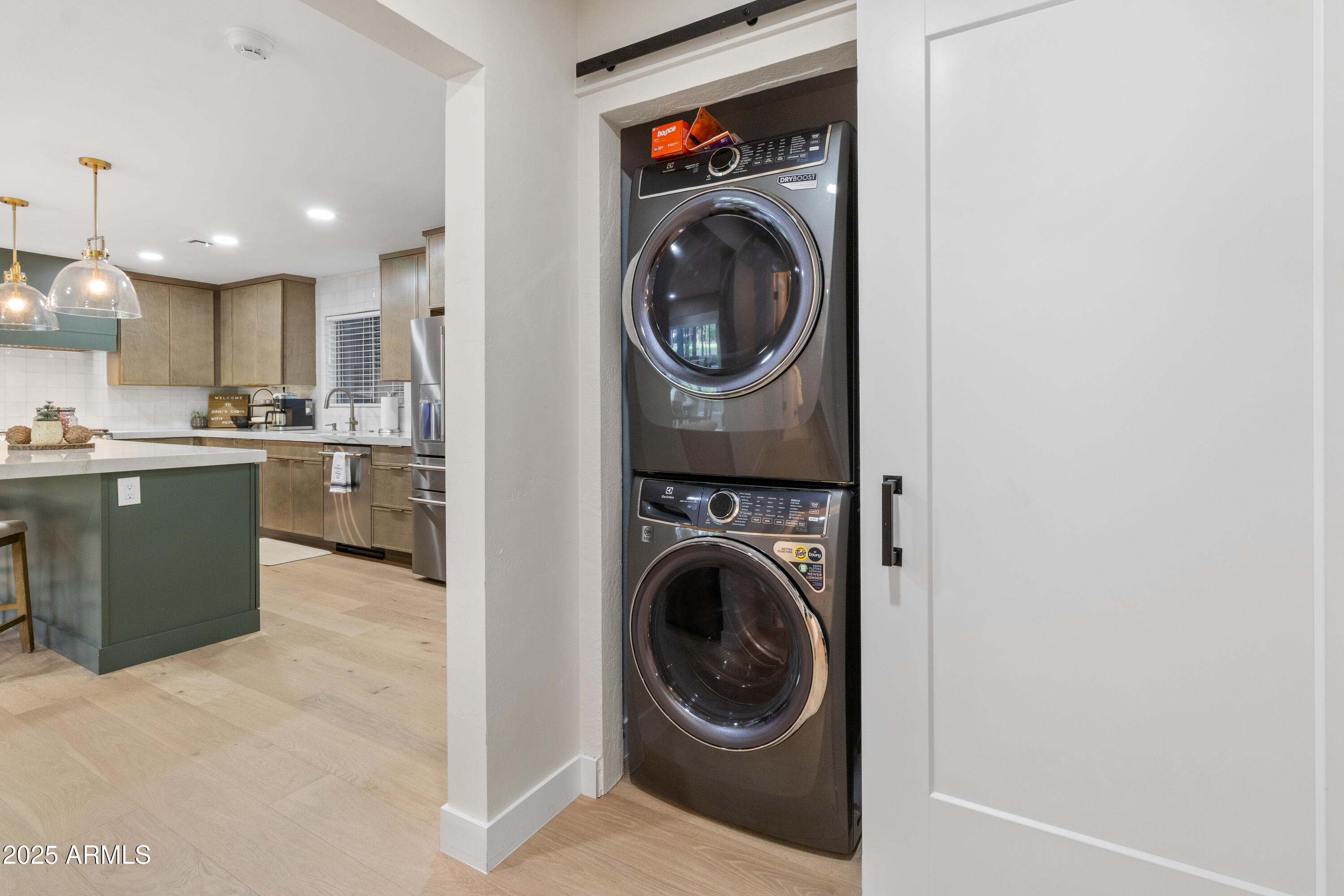 7451 Buck Springs Road Pinetop, AZ 85935 - Photo 18 of 35 a view of a kitchen with a washer and dryer