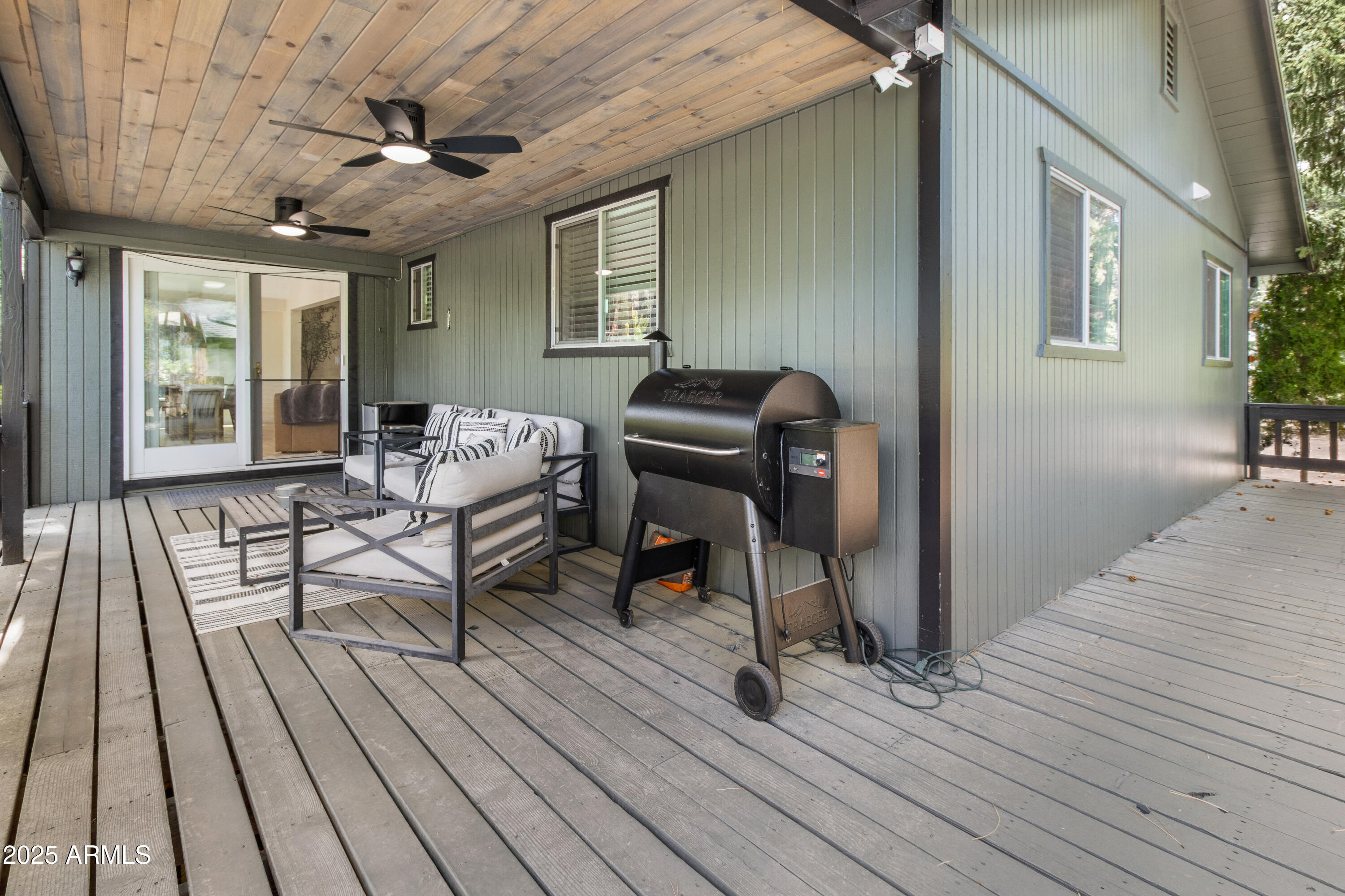 7451 Buck Springs Road Pinetop, AZ 85935 - Photo 30 of 35 a living room with furniture and a wooden floor