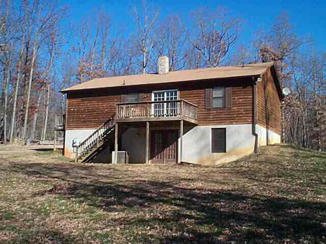 963 Doctors Road Louisa, VA 23093 - Photo 3 of 4 a view of house with trees in the background