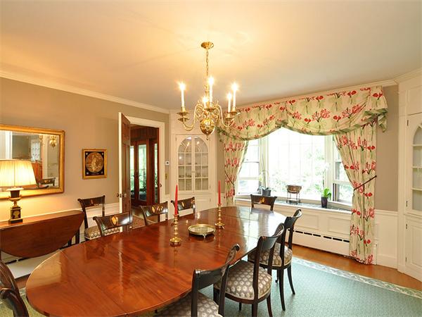 207 Concord Road Lincoln, MA 01773 - Photo 11 of 29 a dining room with furniture a chandelier and wooden floor