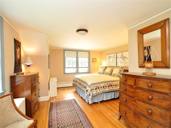207 Concord Road Lincoln, MA 01773 - Photo 17 of 29 a bedroom with a large bed and a window