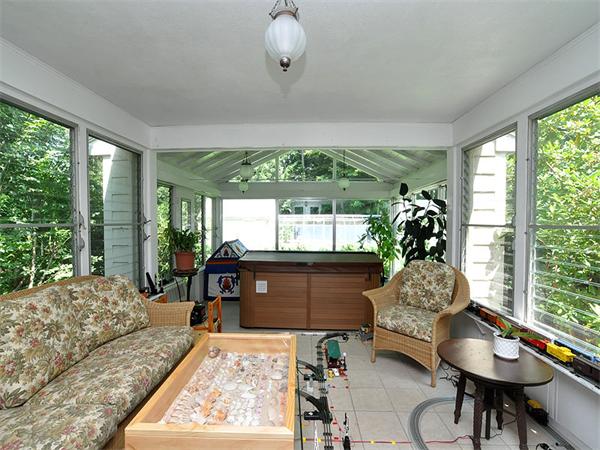 207 Concord Road Lincoln, MA 01773 - Photo 24 of 29 a living room with furniture and a large window