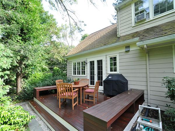 207 Concord Road Lincoln, MA 01773 - Photo 25 of 29 a view of a patio with a table and chairs