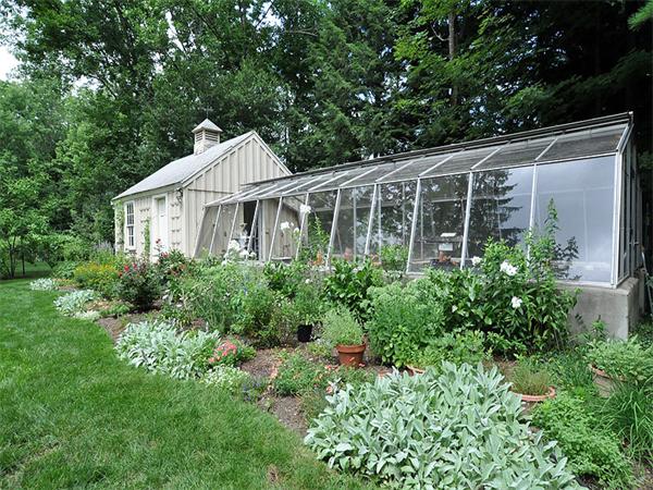 207 Concord Road Lincoln, MA 01773 - Photo 5 of 29 a view of house with garden and tall trees
