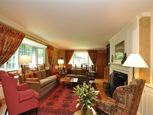 207 Concord Road Lincoln, MA 01773 - Photo 7 of 29 a living room with furniture fireplace and a large window