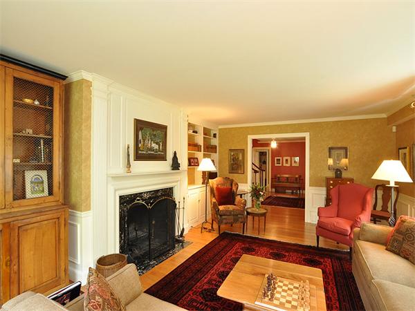 207 Concord Road Lincoln, MA 01773 - Photo 8 of 29 a living room with furniture and a fireplace
