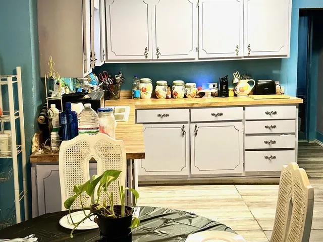 a bathroom with a sink and mirror
