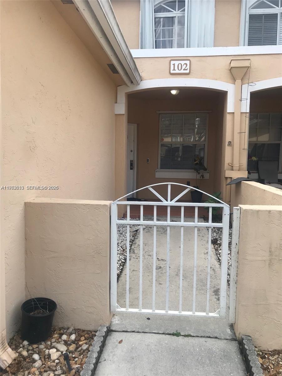 14621 Balgowan Road, Unit 1023 Miami Lakes, FL 33016 - Photo 3 of 21 a front view of a building