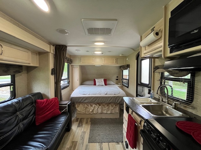 2795 East 28th Road Marseilles, IL 61341 - Photo 15 of 62 a living room with a couch and a flat screen tv