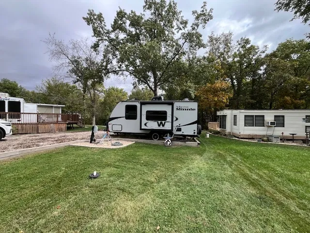 a view of a house with a yard porch and sitting area