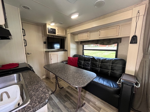 2795 East 28th Road Marseilles, IL 61341 - Photo 7 of 62 a living room with furniture and a flat screen tv