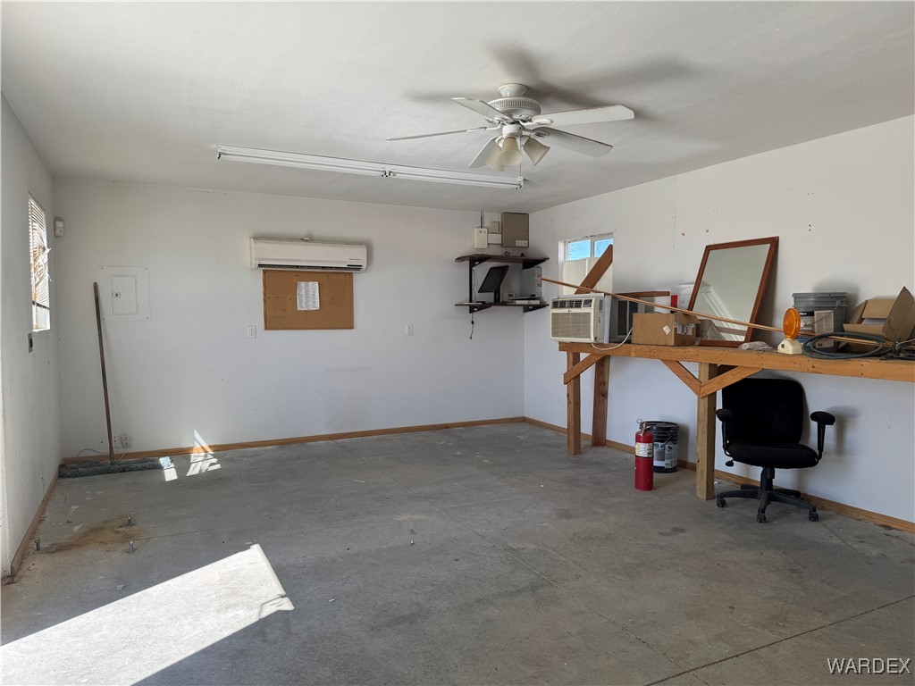 12248 South Yucca Frontage Road Yucca, AZ 86438 - Photo 16 of 16 a view of a workspace with furniture