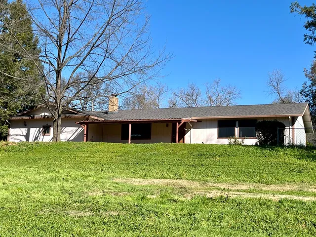 a house view with a outdoor space
