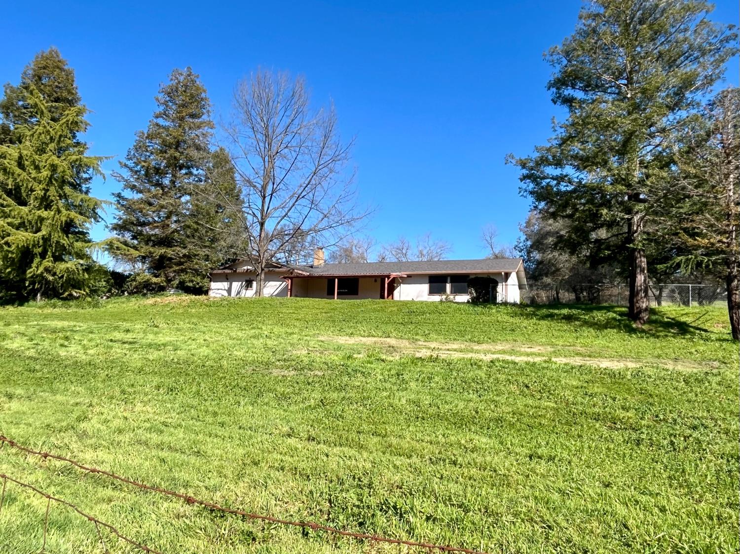 10747 Mt Vernon Road Auburn, CA 95603 - Photo 2 of 33 a view of a house with a yard