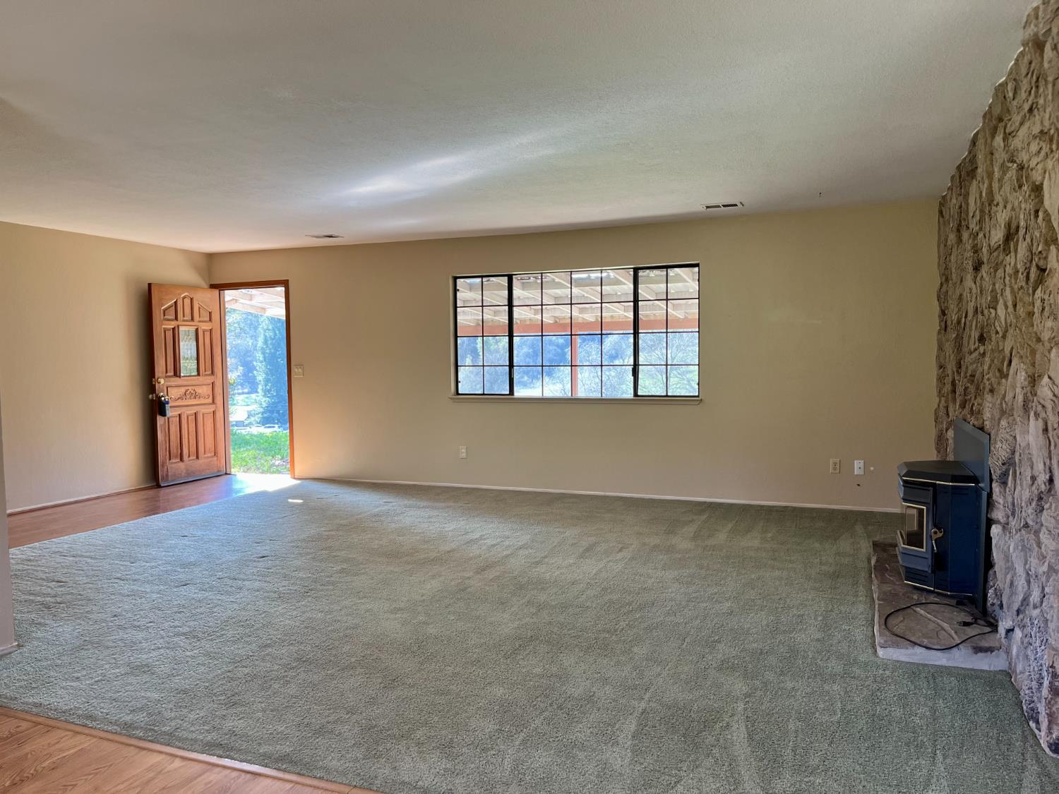 10747 Mt Vernon Road Auburn, CA 95603 - Photo 8 of 33 an empty room with windows