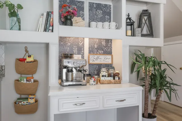 a bathroom view of a sink and wooden floor