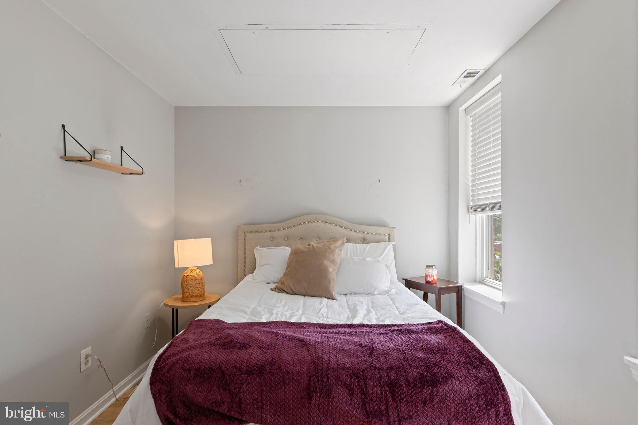 32 West Montgomery Street, Unit C Baltimore, MD 21230 - Photo 12 of 23 a bedroom with a bed and a window