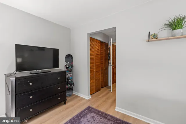 a room with furniture and flat screen tv