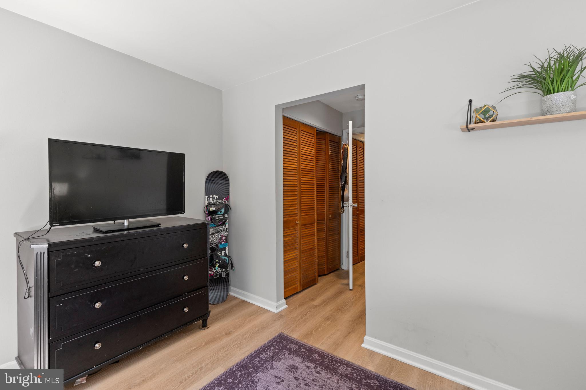 32 West Montgomery Street, Unit C Baltimore, MD 21230 - Photo 13 of 23 a room with furniture and flat screen tv