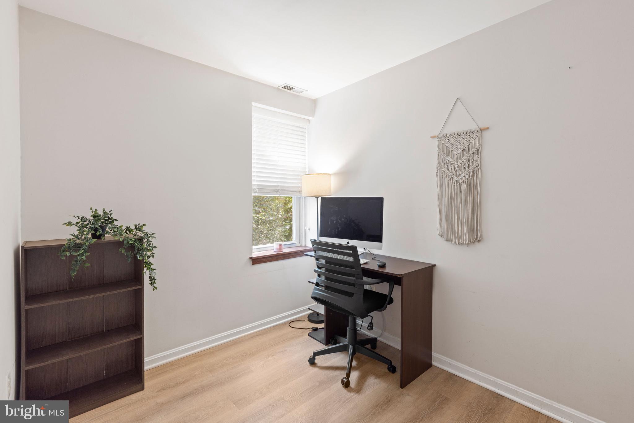 32 West Montgomery Street, Unit C Baltimore, MD 21230 - Photo 15 of 23 a view of a workspace with furniture and a window
