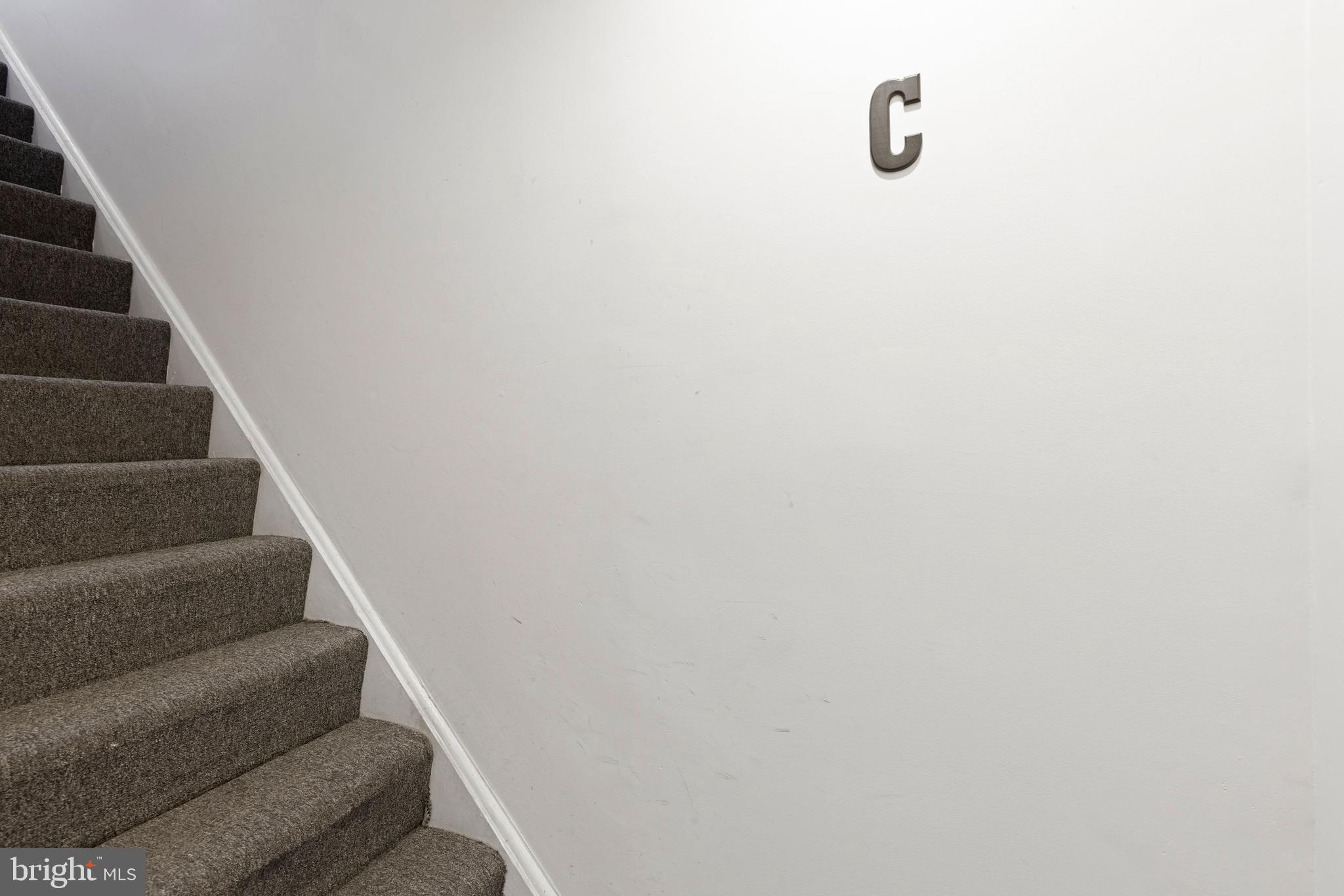 32 West Montgomery Street, Unit C Baltimore, MD 21230 - Photo 19 of 23 a view of staircase with white walls
