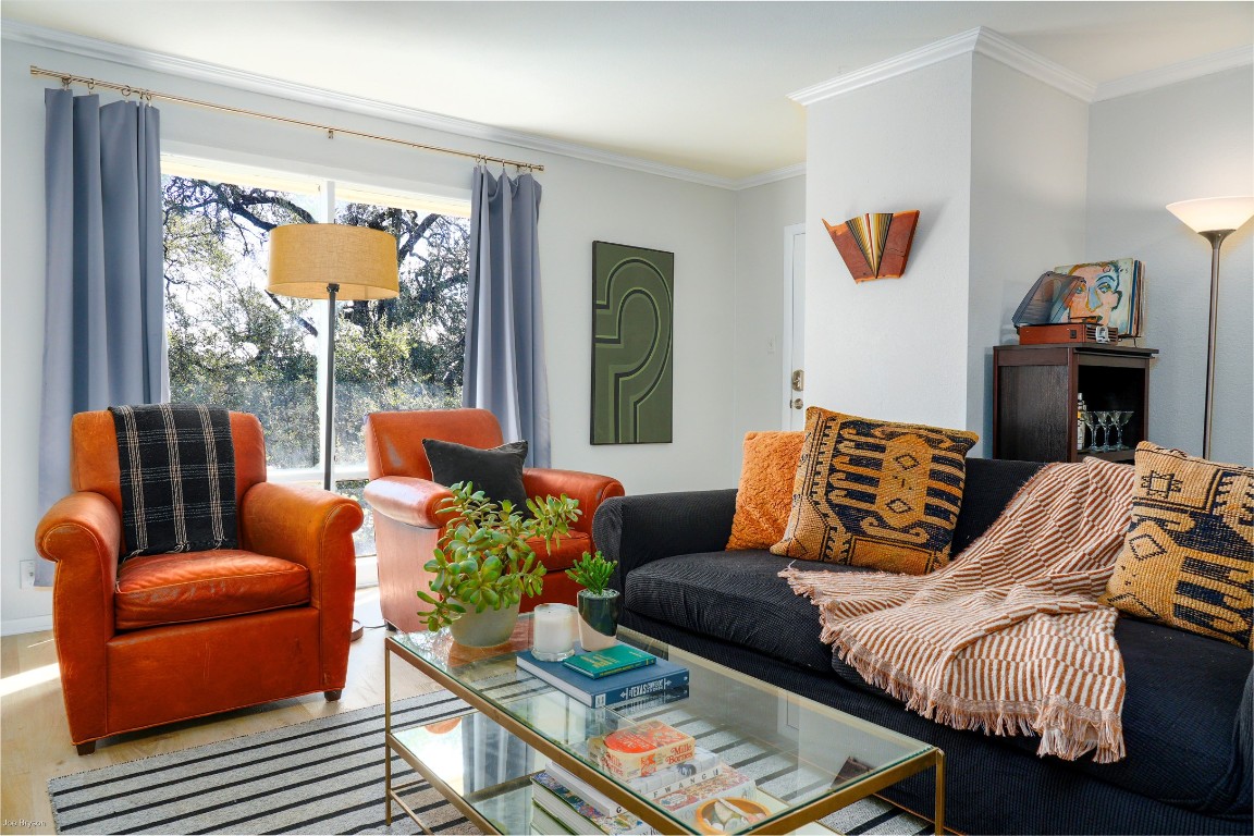 5326 Balcones Drive, Unit D Austin, TX 78731 - Photo 1 of 28 a living room with furniture two window and a flat screen tv
