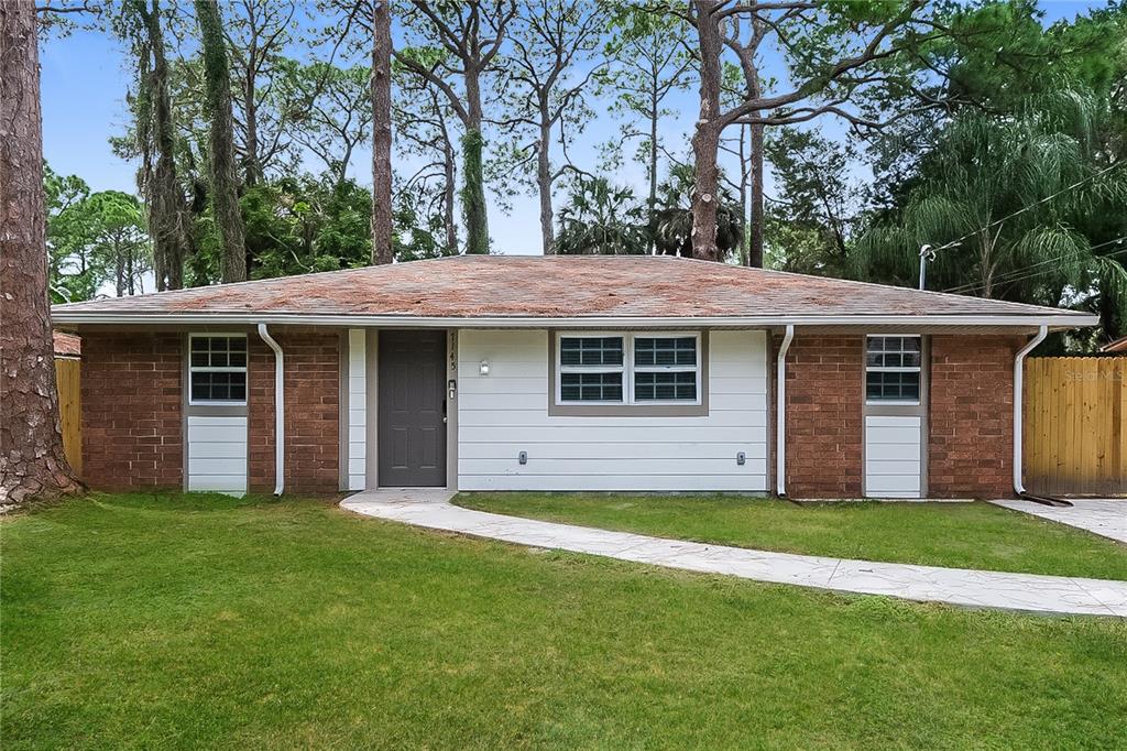 a view of a house with a garden