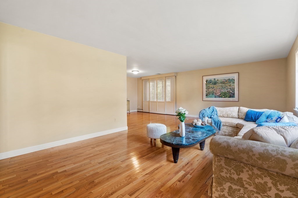 16 Carlton Road Marblehead, MA 01945 - Photo 6 of 42 a living room with furniture and wooden floor