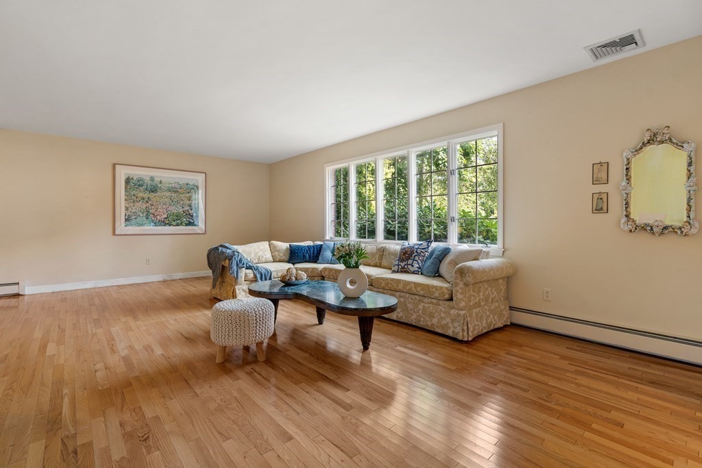 16 Carlton Road Marblehead, MA 01945 - Photo 7 of 42 a living room with furniture and a large window