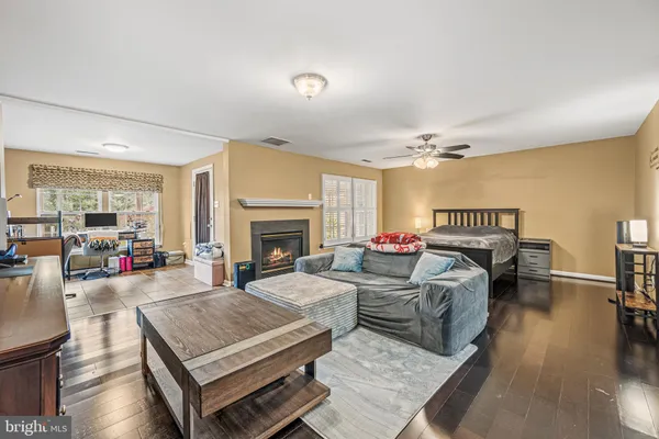 a bed room with a bed and a television