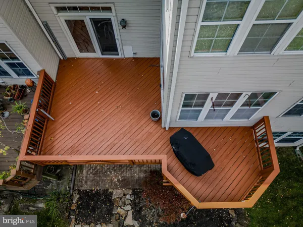 a aerial view of a house with a yard