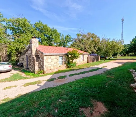 a view of a house with a big yard