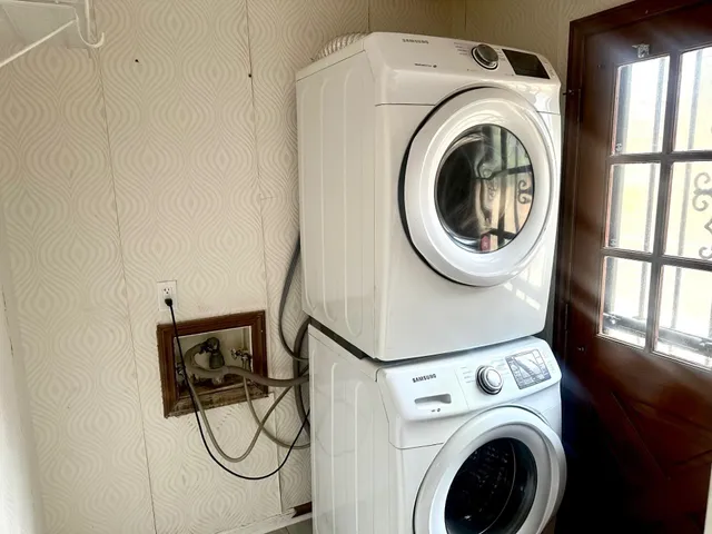 a utility room with dryer and washer