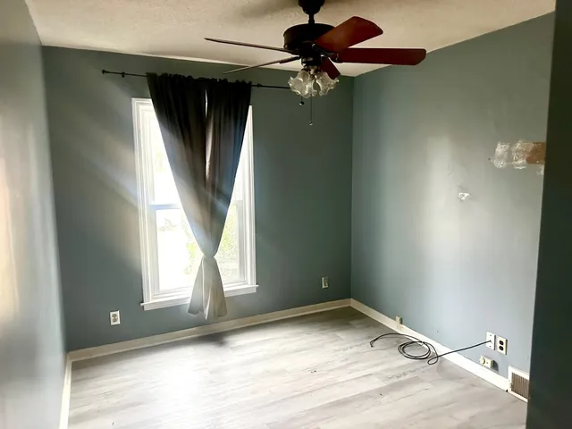 a view of a window in an empty room